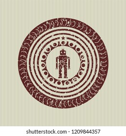 Red robot icon inside rubber stamp with grunge texture