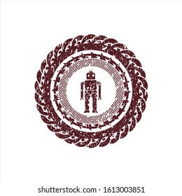 Red robot icon inside rubber grunge texture seal