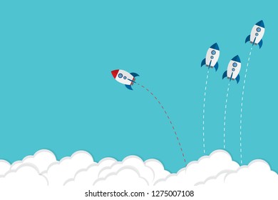 Red rocket changing direction and white ones. New idea, change, trend, courage, creative solution, innovation and unique way concept.