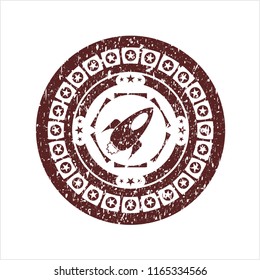 Red rocket icon inside distressed rubber grunge texture seal