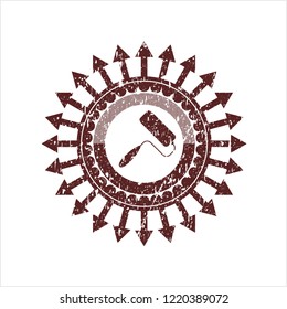 Red roller brush icon inside rubber seal
