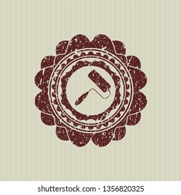 Red roller brush icon inside rubber grunge texture stamp