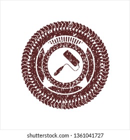 Red roller brush icon inside distress rubber texture