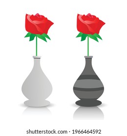 A red rose in a gray vase on a white background