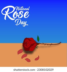 A red rose on a table with fallen leaves to commemorate the national red rose day 