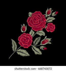 Red roses. Embroidered flowers and leaves.