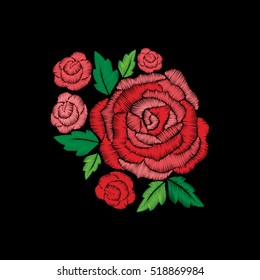 Red roses embroidery on black background. 