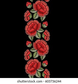 Red roses and green leaves on a black background. Embroidery flowers. Vector floral print.