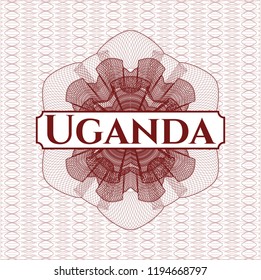 Red rosette or money style emblem with text Uganda inside