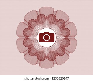 Red rosette (money style emblem) with photo camera icon inside
