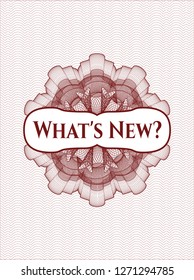 Red rosette or money style emblem with text What's New? inside