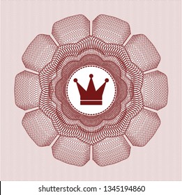 Red rosette (money style emblem) with crown icon inside