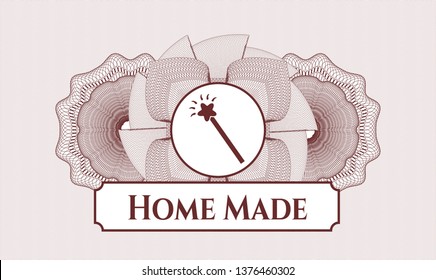 Red rosette or money style emblem with magic stick icon and Home Made text inside