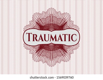 Red rosette or money style emblem with text Traumatic inside