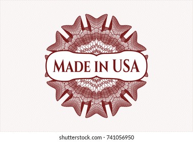 Red rosette or money style emblem with text Made in USA inside