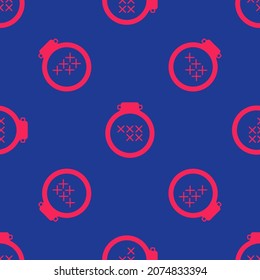 Red Round adjustable embroidery hoop icon isolated seamless pattern on blue background. Thread and needle for embroidery.  Vector