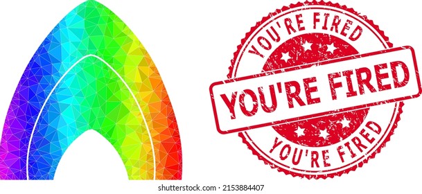 Red round grunge YOU'RE FIRED seal and lowpoly fire flame icon with spectrum colored gradient. Triangulated rainbow vibrant fire flame polygonal icon illustration.