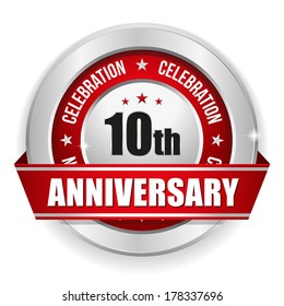 Red round ten year anniversary badge with ribbon