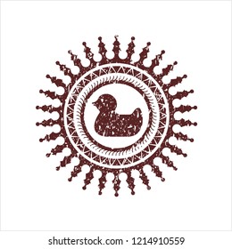 Red rubber duck icon inside rubber texture