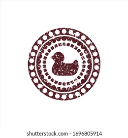 Red rubber duck icon inside distress rubber seal with grunge texture