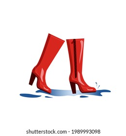 Las botas altas de goma rojas se salpican a través de charcos, aislados en un fondo blanco. Zapatos elegantes para el clima otoñal