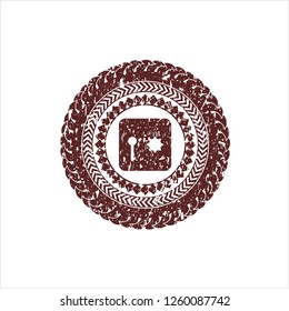 Red safe, safety deposit box icon inside rubber seal with grunge texture