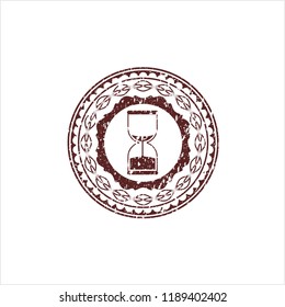 Red sand clock icon inside rubber grunge texture stamp