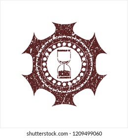 Red sand clock icon inside rubber grunge texture stamp
