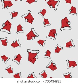 Red Santa hats. Seamless pattern. Hand drawn vector stock illustration