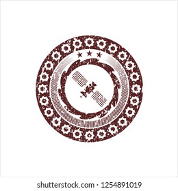 Red satelite icon inside rubber stamp