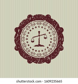 Red scale icon inside distress rubber grunge seal