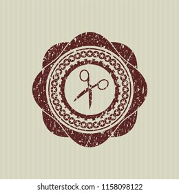 Red scissors icon inside distress grunge style stamp