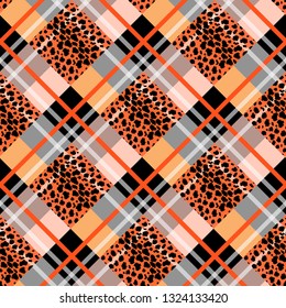 Red Scottish tartan grunge seamless pattern with leopard spots eps 10