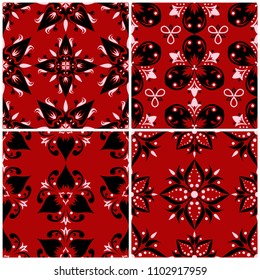 Red seamless backgrounds with black and white floral patterns for wallpapers, textile and fabrics