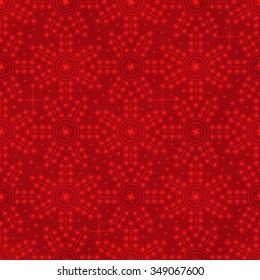 Red seamless holiday background of snowflakes