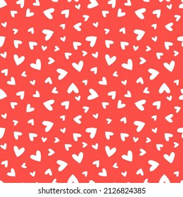 Red seamless pattern with white hearts.