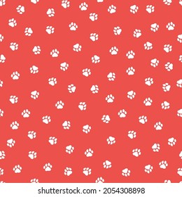 Red seamless pattern with white paws.