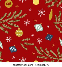 Red seamless vector pattern with fir brunches, snowflakes and toys. Traditional red, green, mint and gold colors. For packaging, wrapping paper, textile, wallpaper or scrapbooking paper 