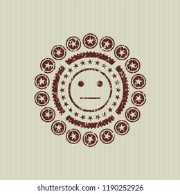 Red serious face icon inside rubber stamp