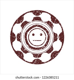 Red serious face icon inside distress rubber seal with grunge texture