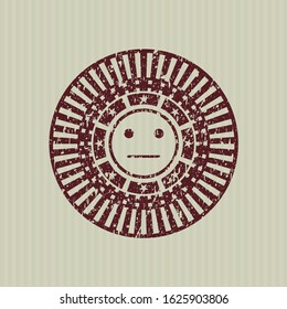 Red serious face icon inside distressed grunge style stamp