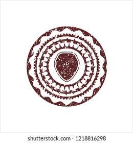 Red shield icon inside distressed grunge style stamp