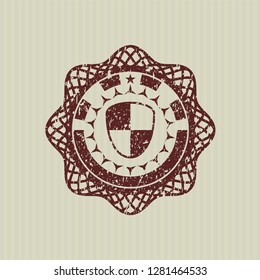 Red shield, safety icon inside distressed grunge style stamp