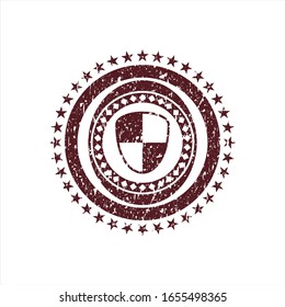 Red shield, safety icon inside distress rubber grunge stamp