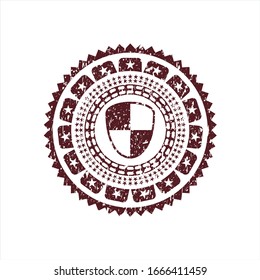 Red shield, safety icon inside rubber stamp with grunge texture