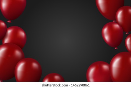 Red shiny air balloons on black background with empty space