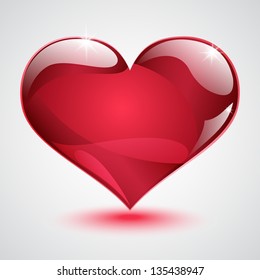 Red shiny heart with shadow and glare