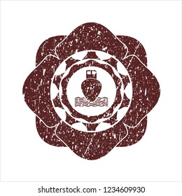 Red ship icon inside distressed rubber stamp