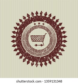 Red shopping cart icon inside rubber grunge stamp