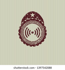 Red signal icon inside distress grunge style stamp